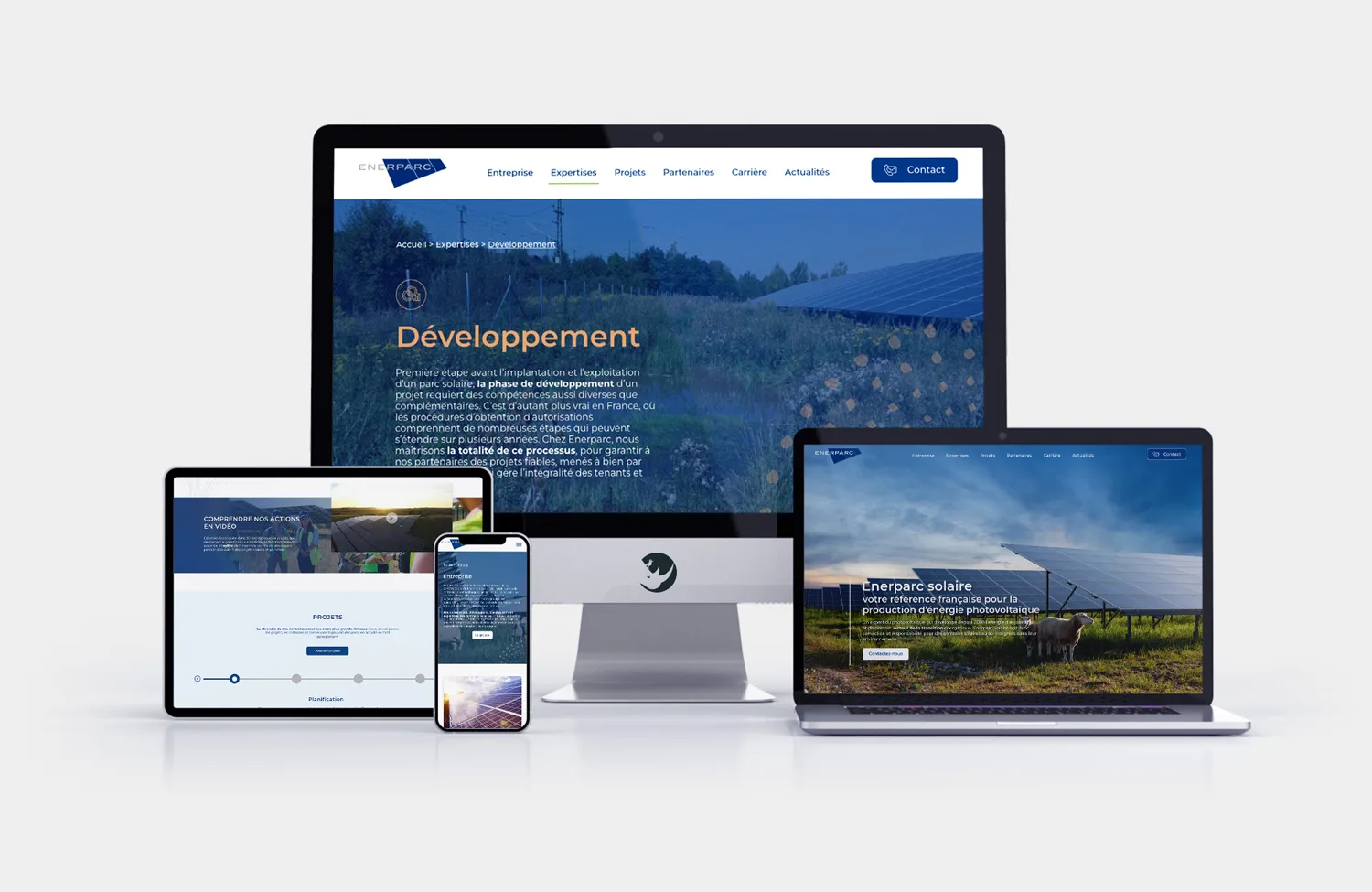 Quatre écrans de tailles différentes affichant le site web d'Enerparc sur un fond gris clair